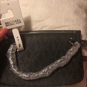Brand new black Michael Kors wristlet